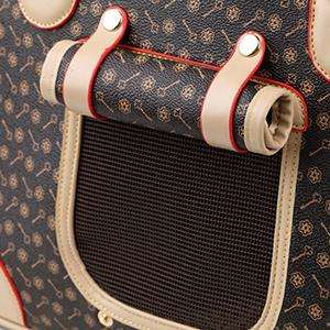 Bolso transportador de lujo en piel sintética para mascotas pequeñas, ideal para viajes en avión.