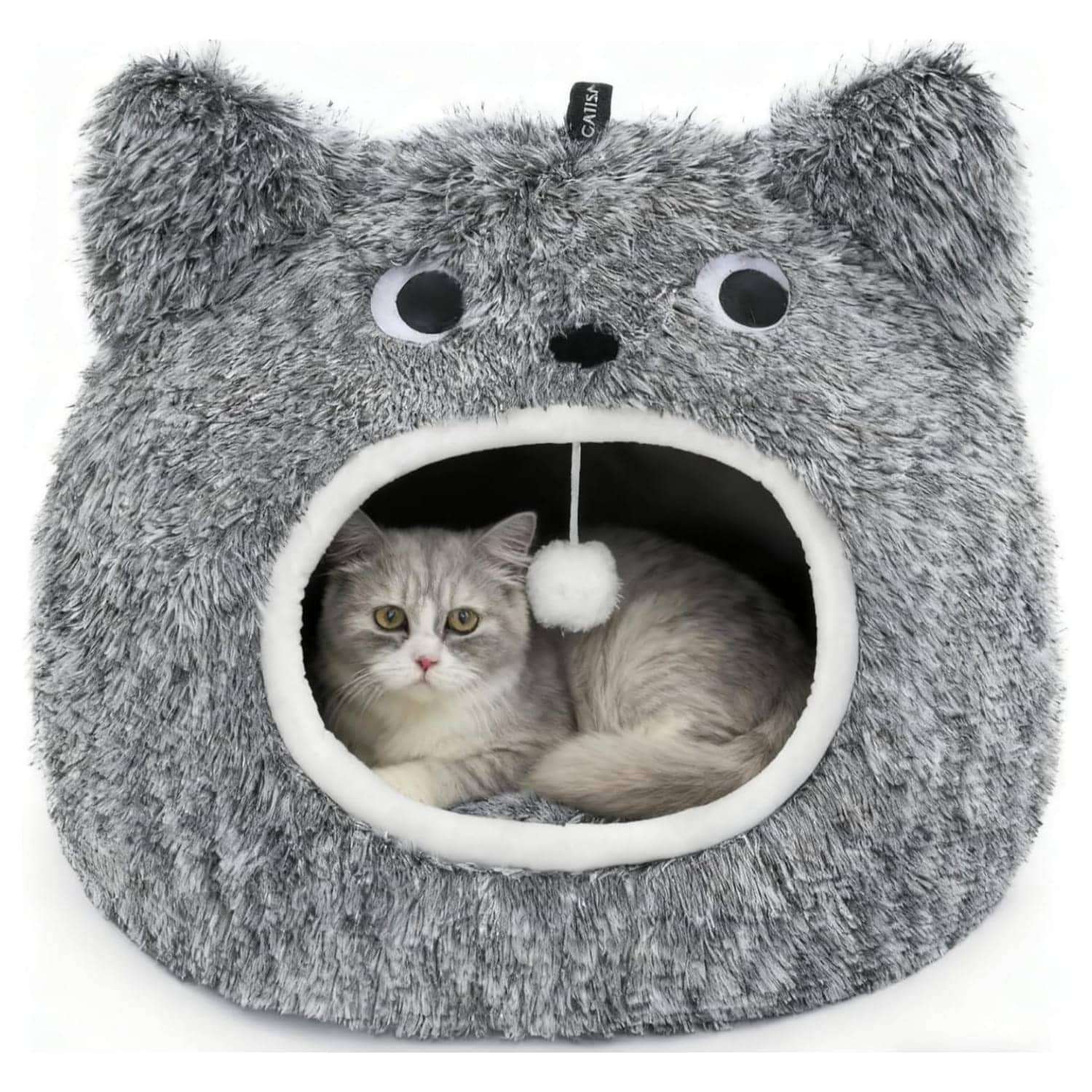 Cama tipo cueva semicerrada de felpa suave con cojin reversible y base antideslizante para gatos.