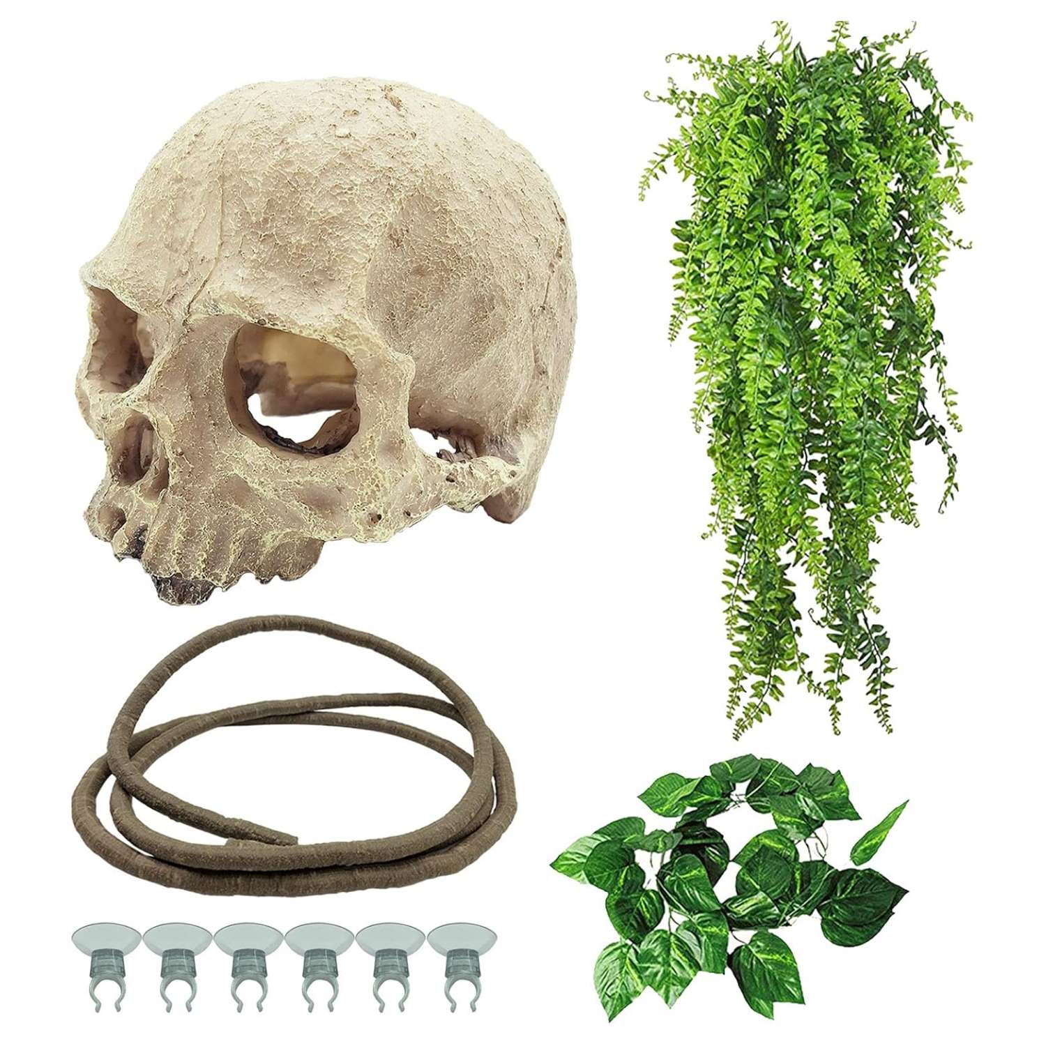 Un kit de decoración de terrario con una calavera humana de resina como escondite y un set de vides trepadoras y follaje artificial.